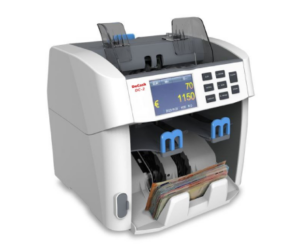 Currency counting machine displaying counts with various notes inserted, featuring a digital screen and keypad.
